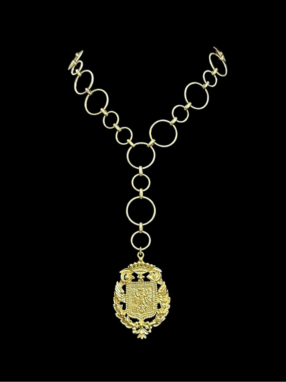 Gold-Tone Circular Link Y Necklace with Ornate Crest Pendant